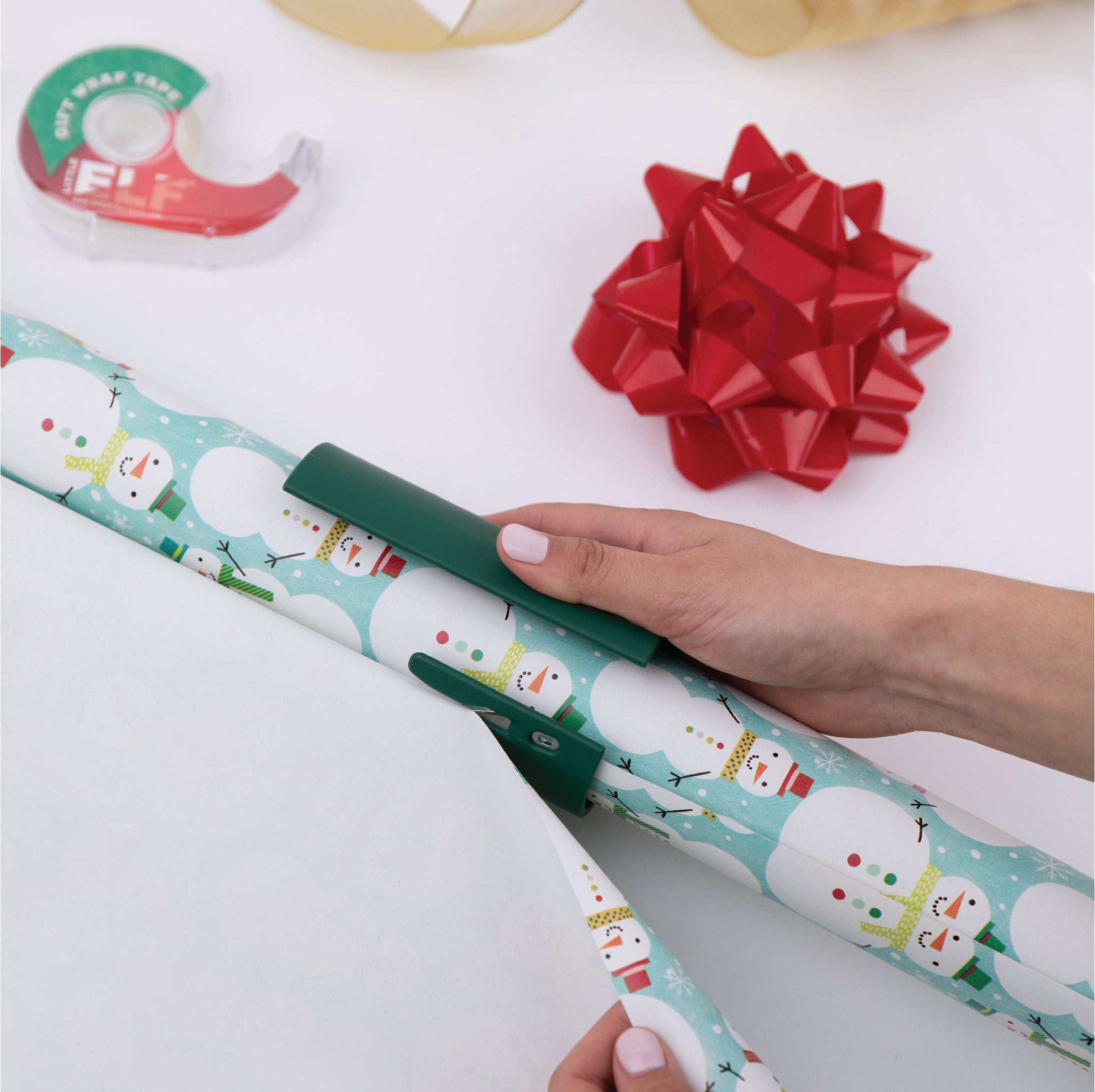 Using the Little ELF Gift Wrap Cutter is THE best! 🎄🎄🎁 #littleelf